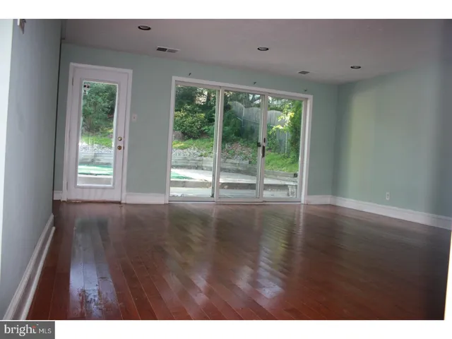 a view interior of a house wooden floor and windows