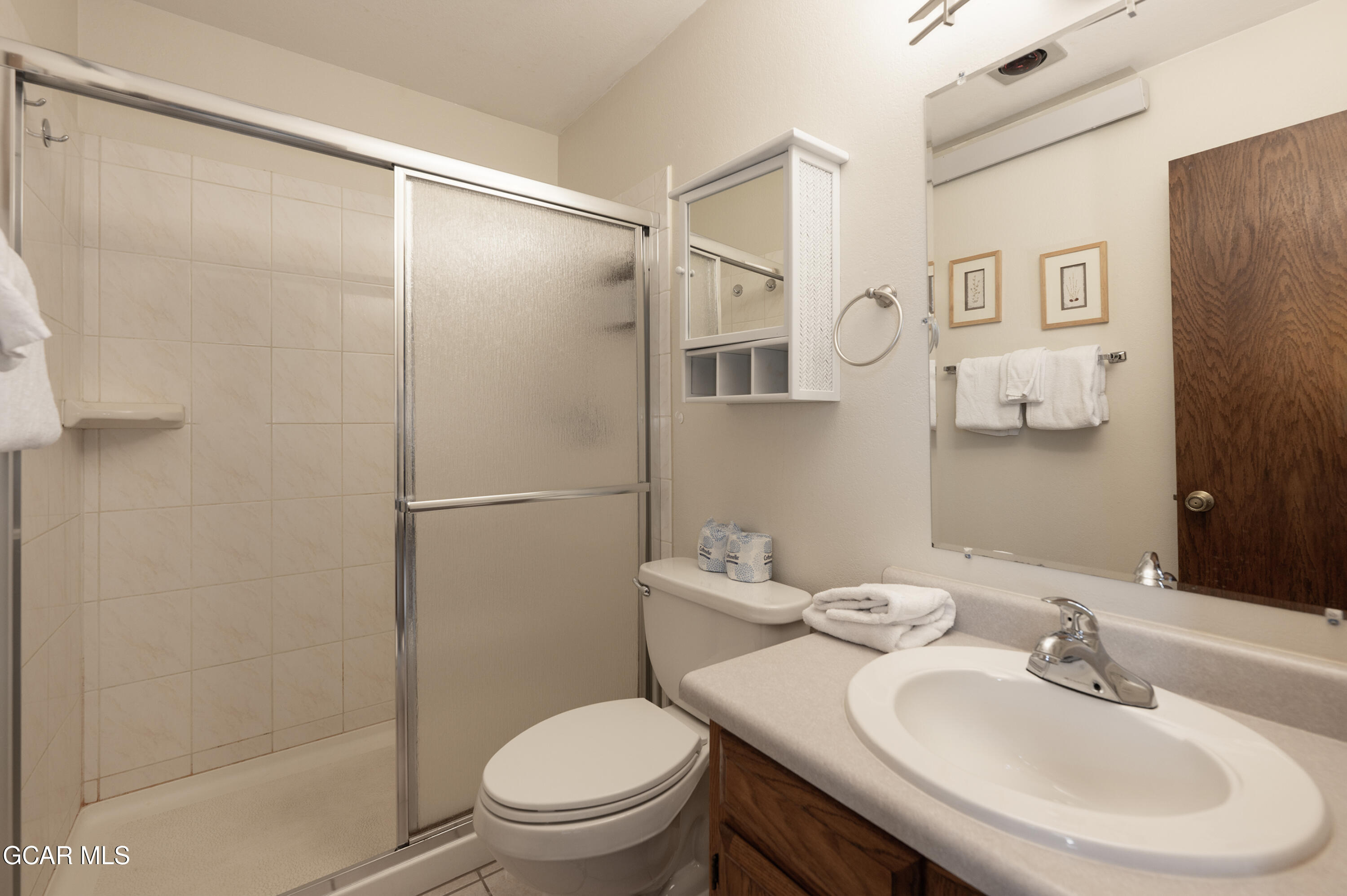 490 Kings Crossing Road, Unit 331 Winter Park, CO 80482 - Photo 13 of 38 a bathroom with a sink toilet and shower