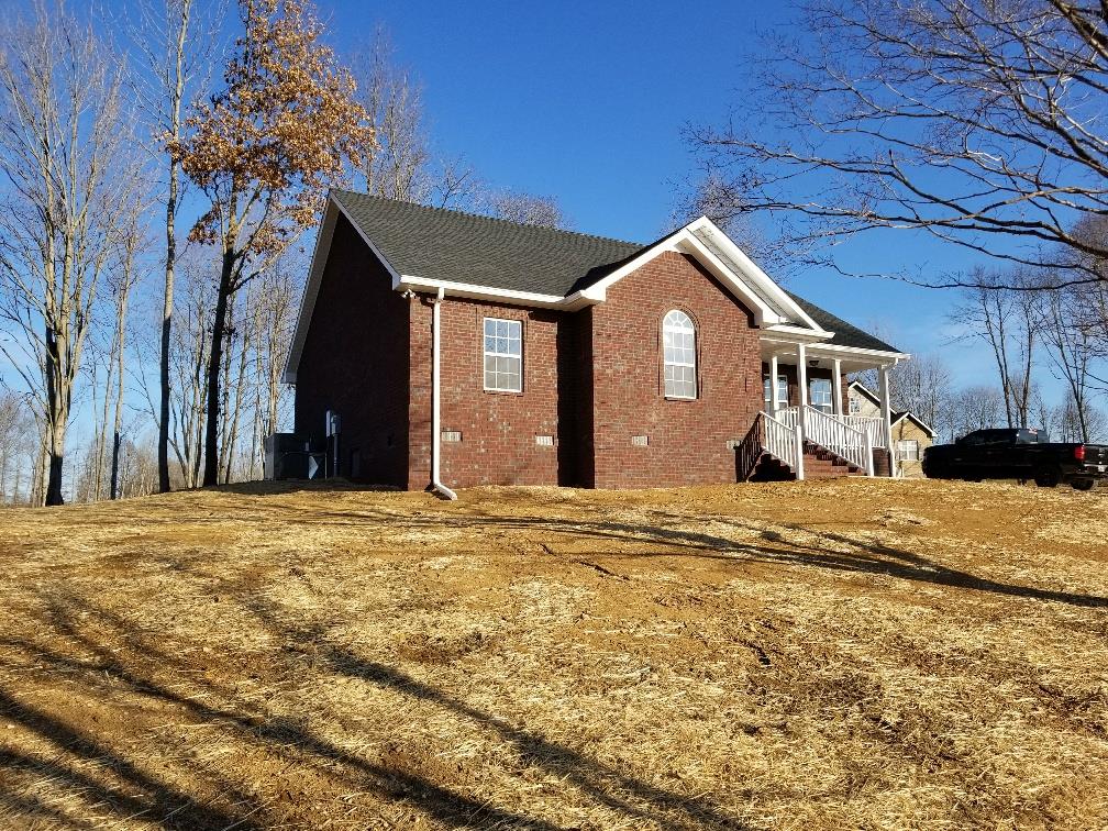 1680 Rock Bridge Road Bethpage, TN 37022 - Photo 2 of 19 a front view of a house with a yard