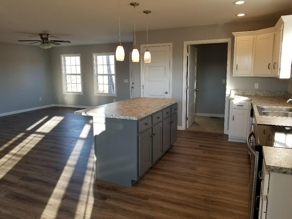 1680 Rock Bridge Road Bethpage, TN 37022 - Photo 9 of 19 a kitchen with counter top space and wooden floor