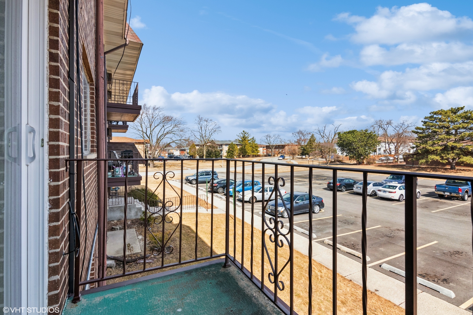 255 North Mill Road, Unit 7B Addison, IL 60101 - Photo 18 of 19 a view of a balcony with an outdoor space