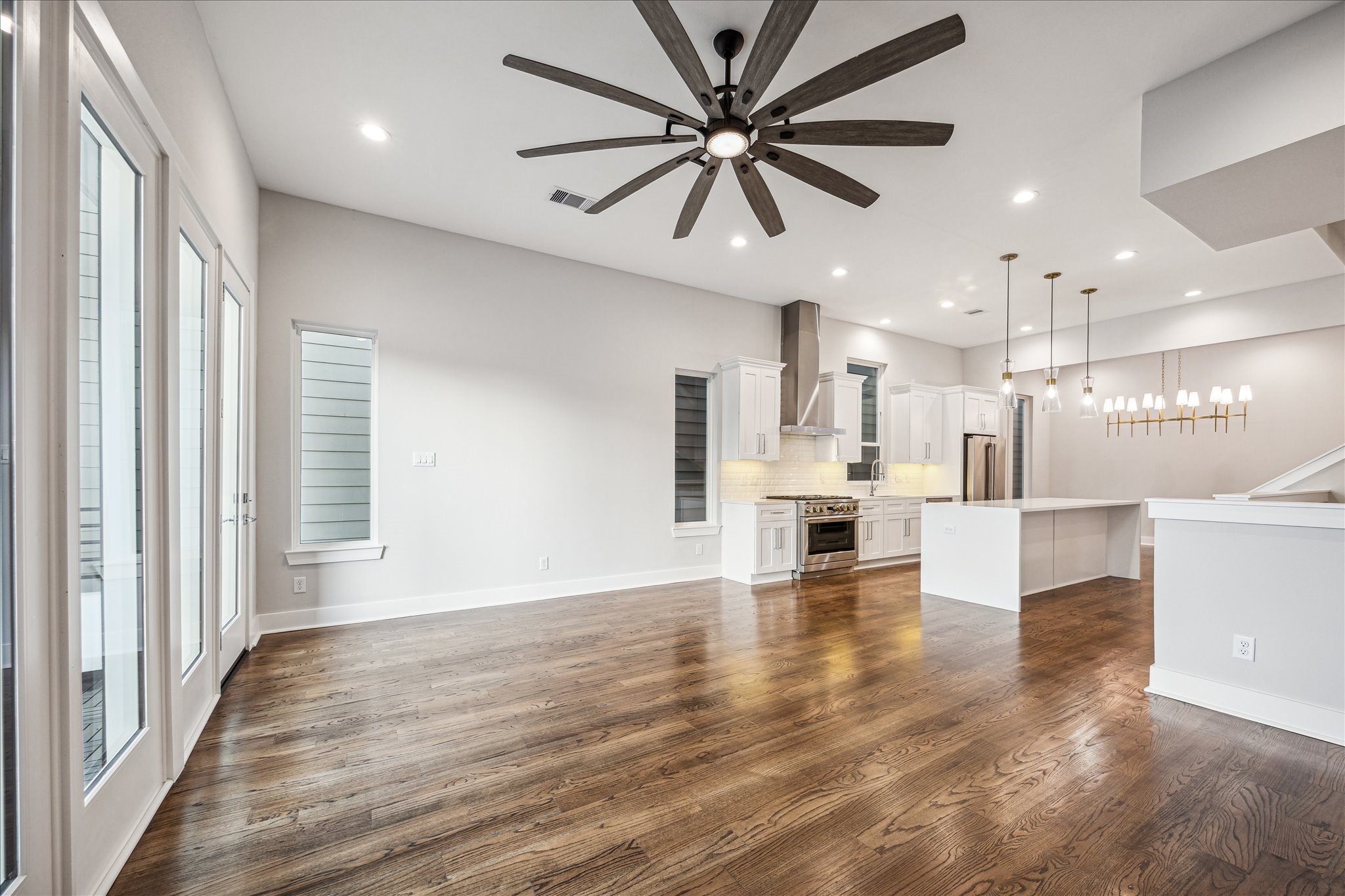 1518 Houston Avenue Houston, TX 77007 - Photo 12 of 40 a view of a kitchen with a stove cabinets and wooden floor