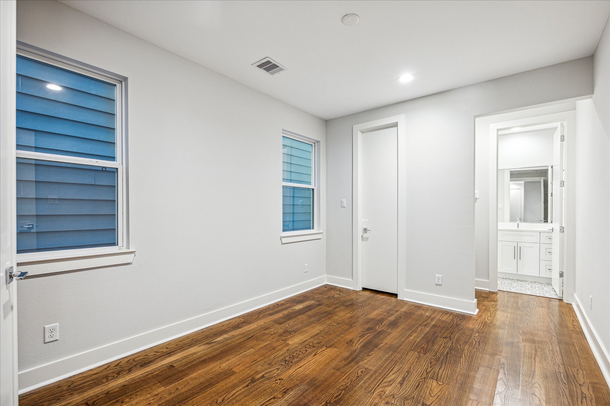 1518 Houston Avenue Houston, TX 77007 - Photo 27 of 40 a view of empty room with wooden floor and fan