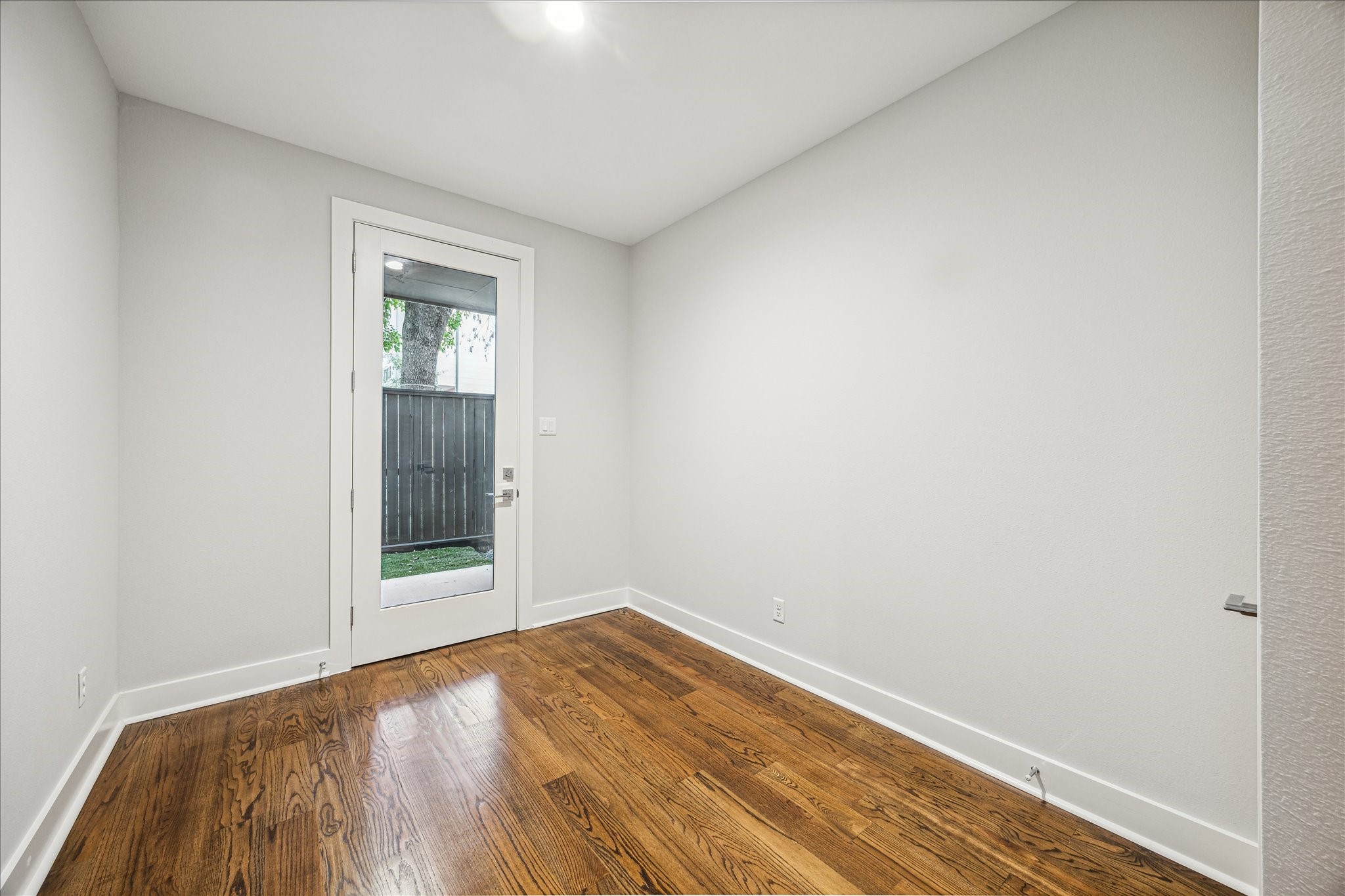 1518 Houston Avenue Houston, TX 77007 - Photo 35 of 40 a view of empty room with wooden floor