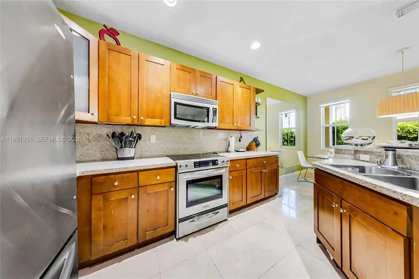 $695,000 | 10711 Northwest 75th Lane, Doral, FL 33178