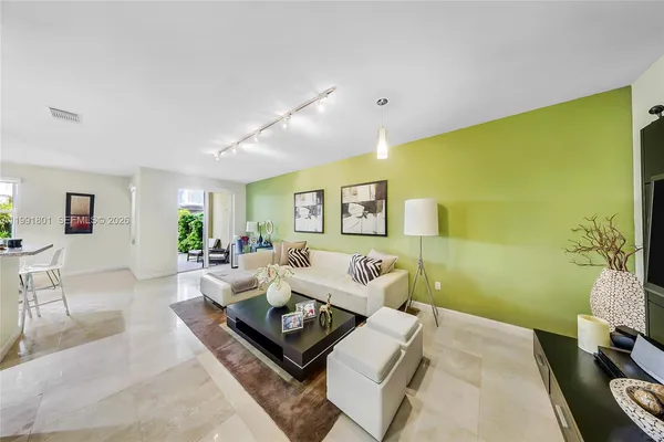 $695,000 | 10711 Northwest 75th Lane, Doral, FL 33178