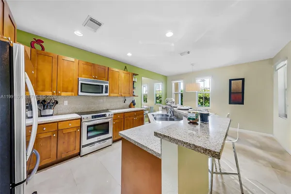 $695,000 | 10711 Northwest 75th Lane, Doral, FL 33178