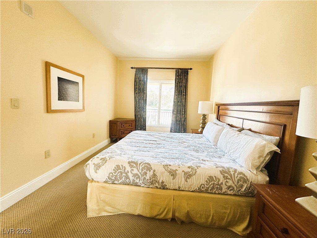 30 Strada Di Villaggio, Unit 531 Henderson, NV 89011 - Photo 20 of 42 Bedroom with baseboards and carpet flooring