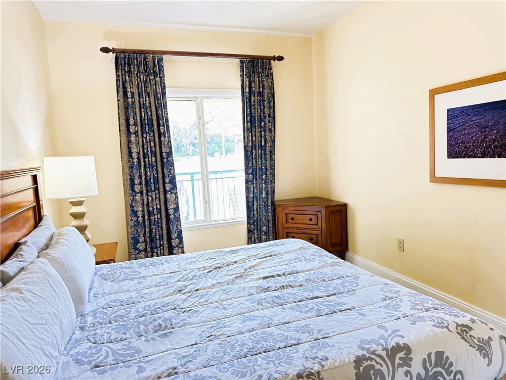 30 Strada Di Villaggio, Unit 531 Henderson, NV 89011 - Photo 5 of 42 Bedroom featuring baseboards