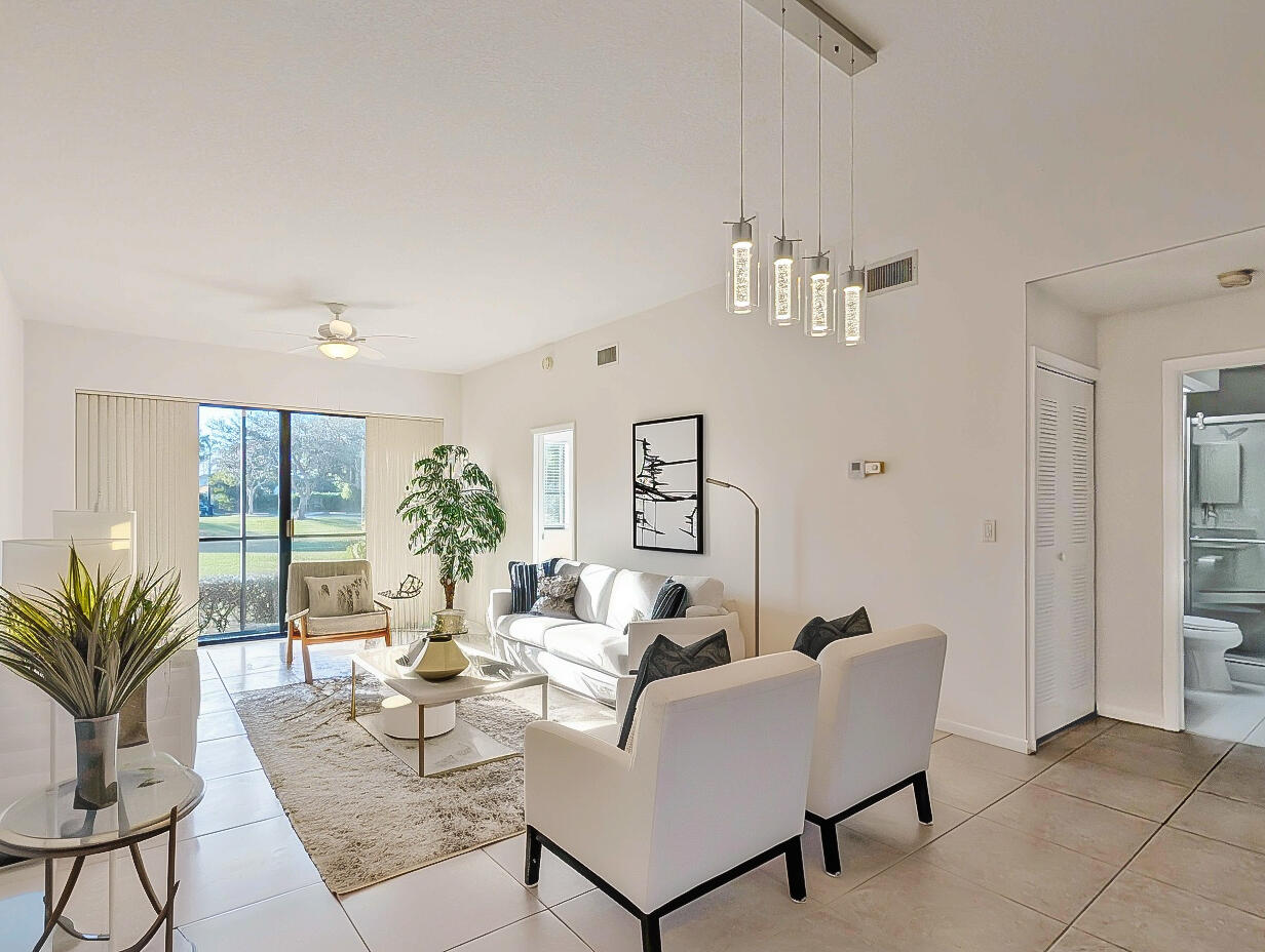 7535 La Paz Boulevard, Unit 107 Boca Raton, FL 33433 - Photo 5 of 22 (2)Staged Living Room