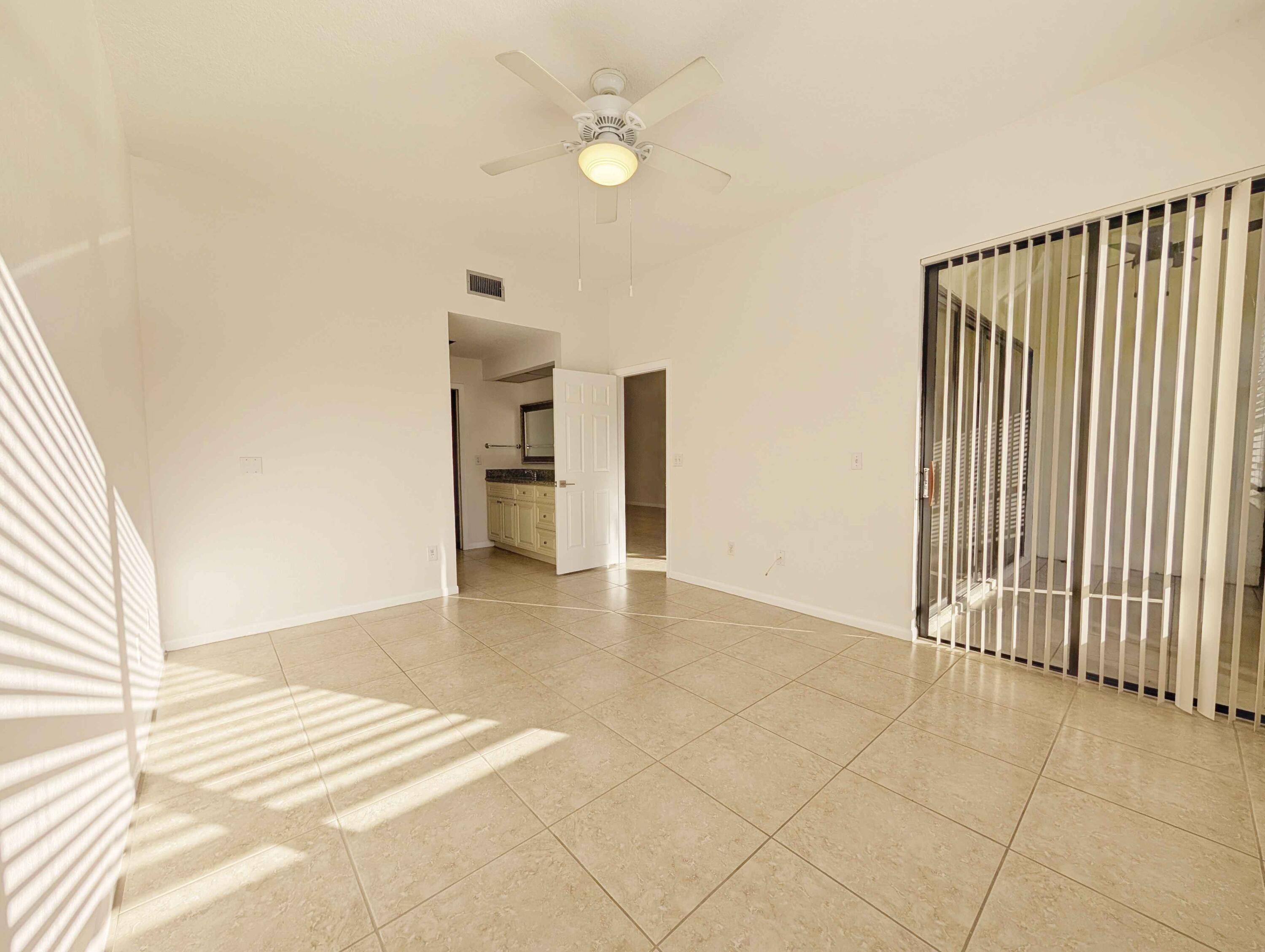 7535 La Paz Boulevard, Unit 107 Boca Raton, FL 33433 - Photo 6 of 22 Primary Bedroom