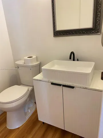 a bathroom with a sink and a toilet