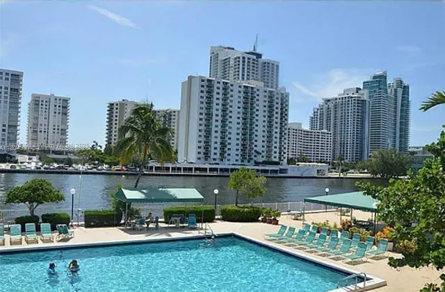 a view of a city with tall buildings