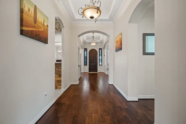 a view of entryway with wooden floor