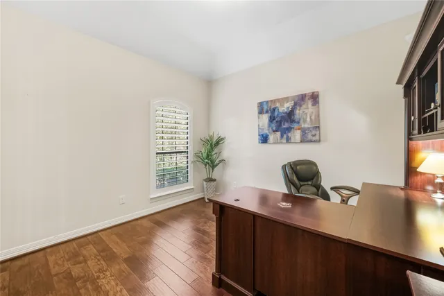 a bathroom with a sink and a large window
