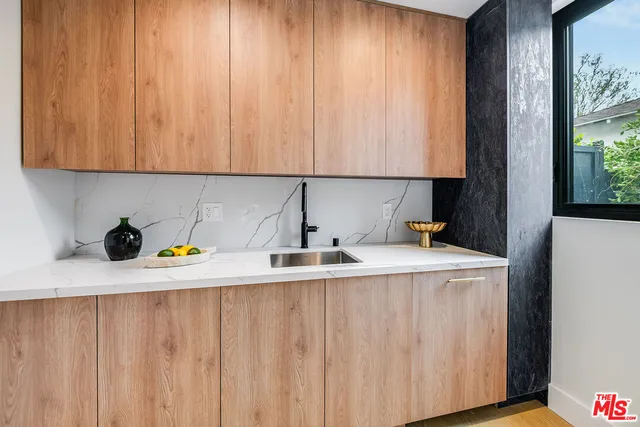 an aerial view of a city with lots of residential buildings