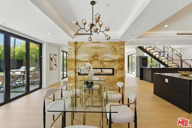 a view of an empty room with a fireplace