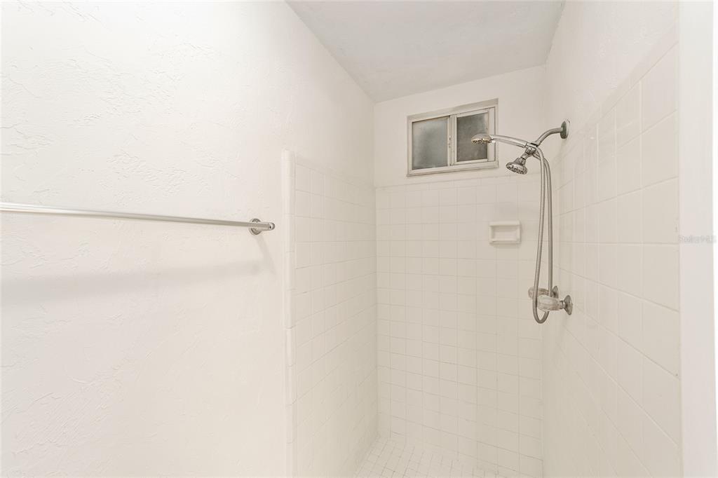 501 Southwest 75th Street, Unit H6 Gainesville, FL 32607 - Photo 31 of 42 a bathroom with a shower