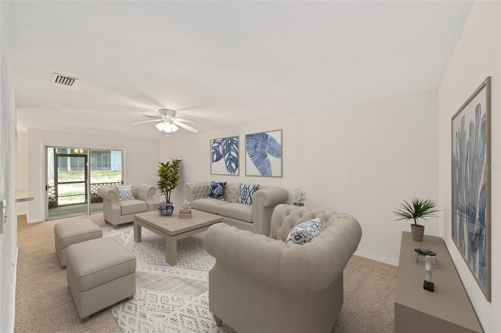 501 Southwest 75th Street, Unit H6 Gainesville, FL 32607 - Photo 4 of 42 a living room with furniture and a large window