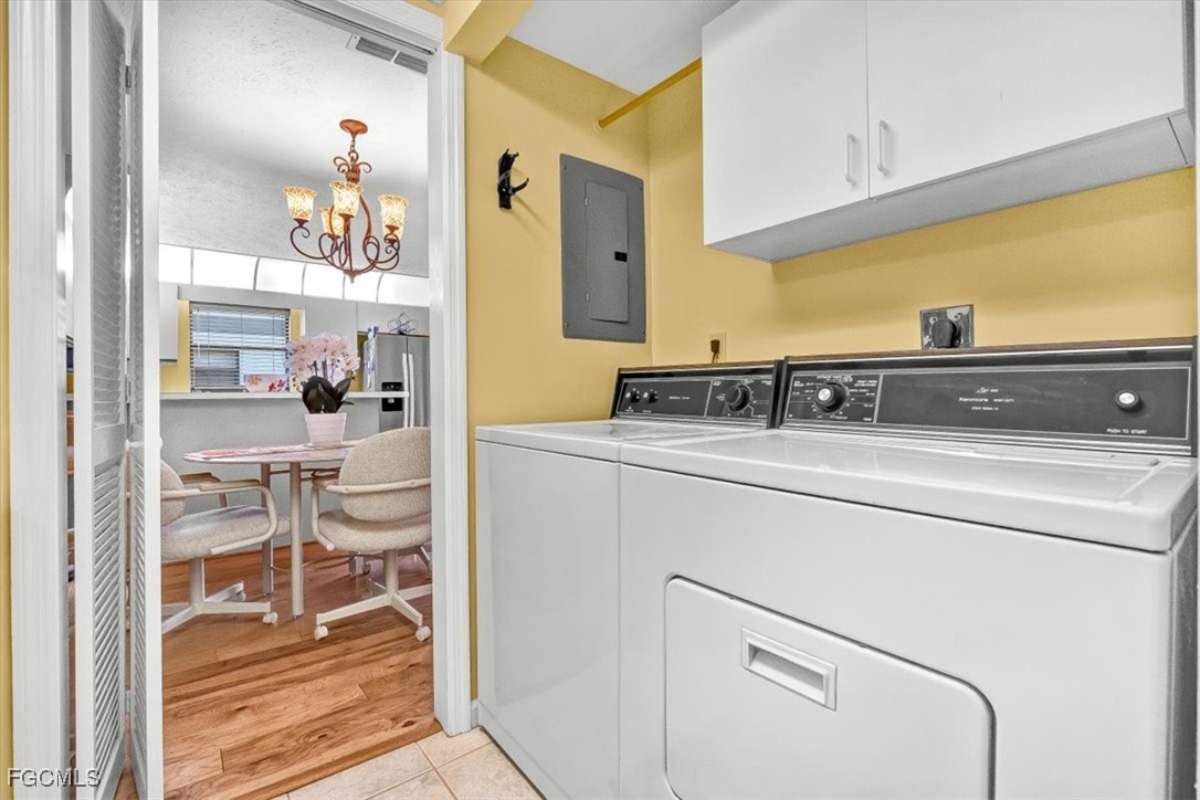 707 Hoover Dike Road, Unit 904 Clewiston, FL 33440 - Photo 15 of 38 a kitchen with a sink and cabinets