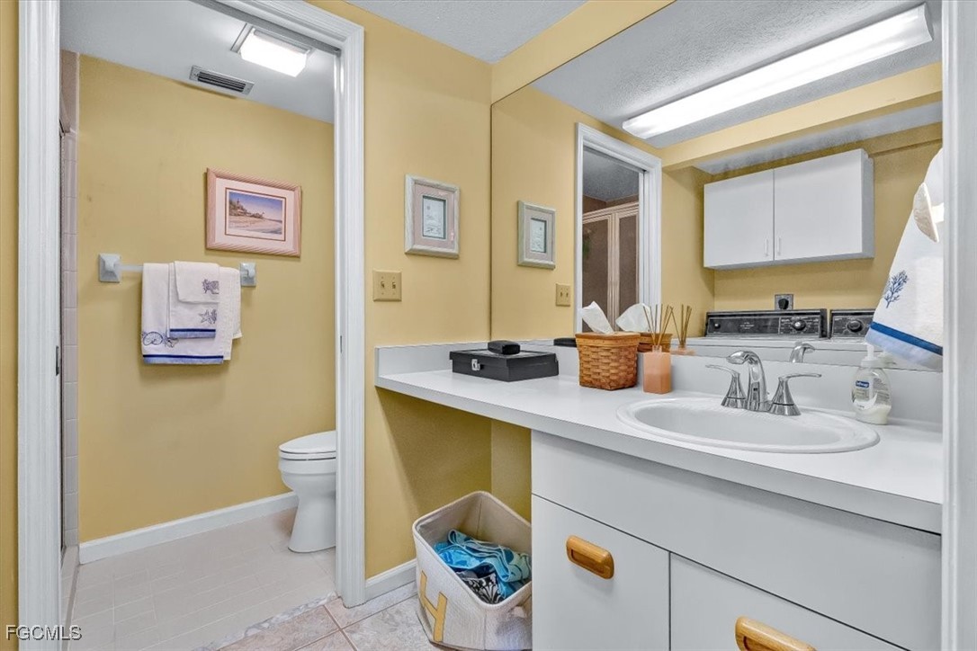 707 Hoover Dike Road, Unit 904 Clewiston, FL 33440 - Photo 24 of 38 a bathroom with a sink and a mirror