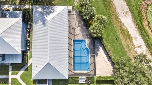 a view of a swimming pool with a patio