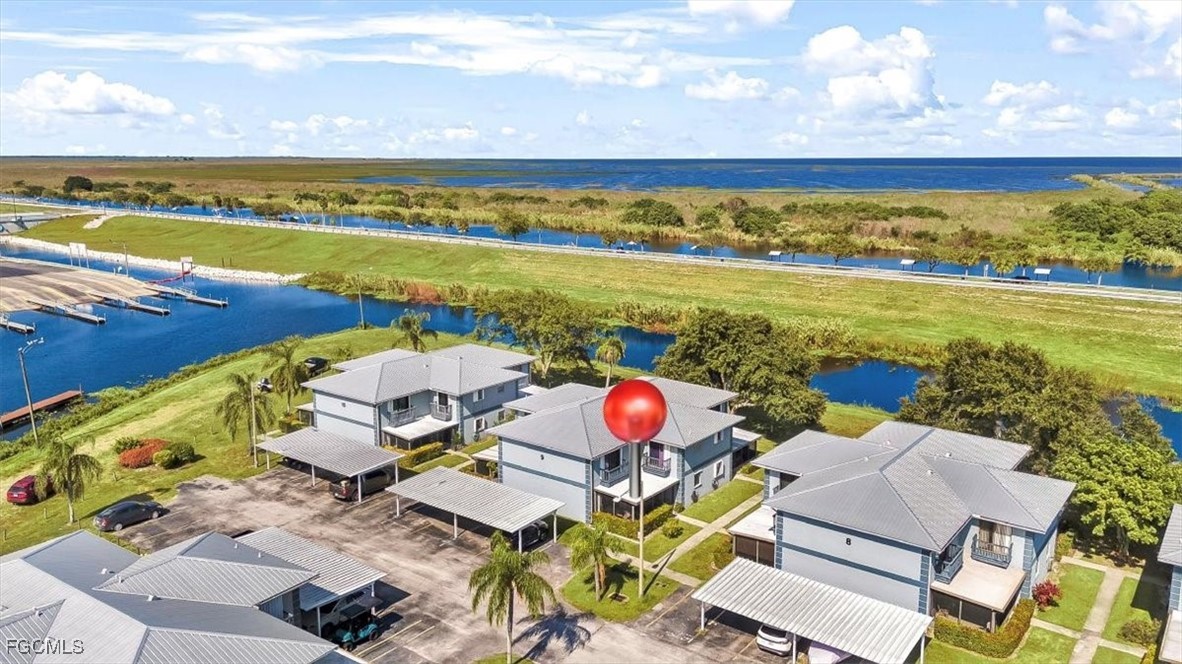 707 Hoover Dike Road, Unit 904 Clewiston, FL 33440 - Photo 32 of 38 a view of an ocean and a mountain view