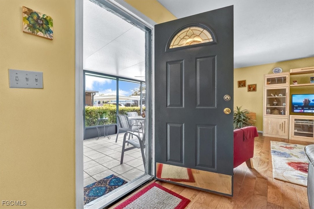 707 Hoover Dike Road, Unit 904 Clewiston, FL 33440 - Photo 5 of 38 image of a livingroom with furniture and next to a window