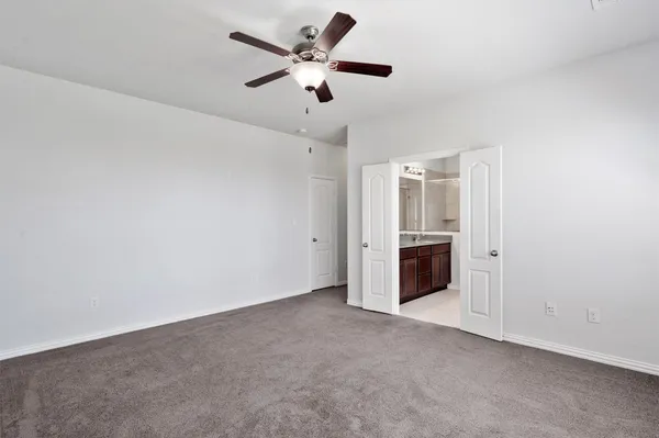 a bathroom with a double vanity sink mirror and double