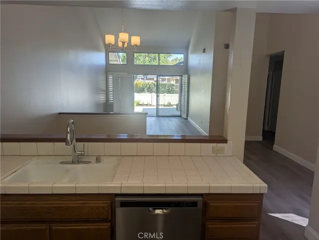 a kitchen with a sink and a window