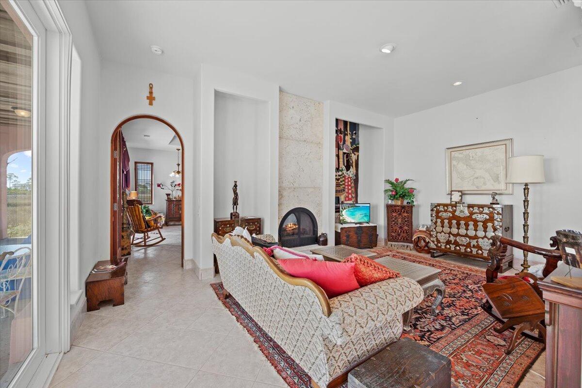 221 Wynnehaven Beach Road Mary Esther, FL 32569 - Photo 13 of 35 a living room with furniture and a fireplace