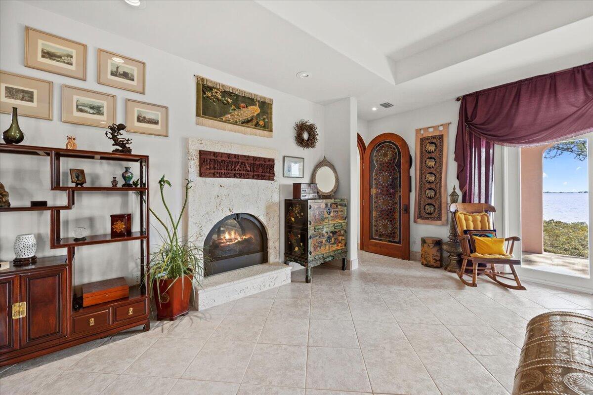 221 Wynnehaven Beach Road Mary Esther, FL 32569 - Photo 15 of 35 a living room with furniture and a fireplace