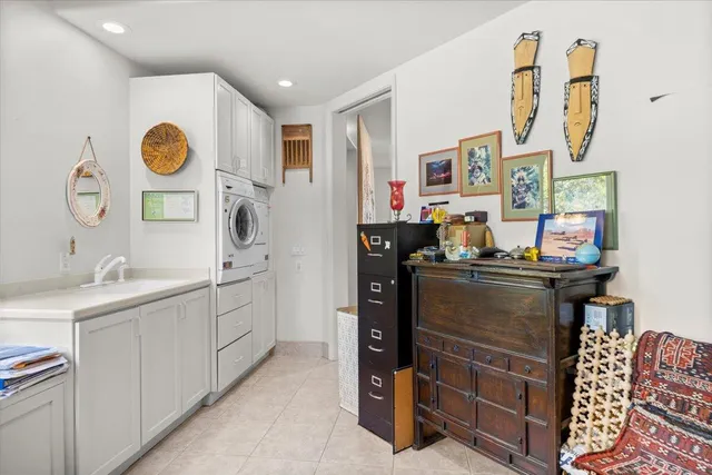 a kitchen with stainless steel appliances granite countertop a sink and a stove