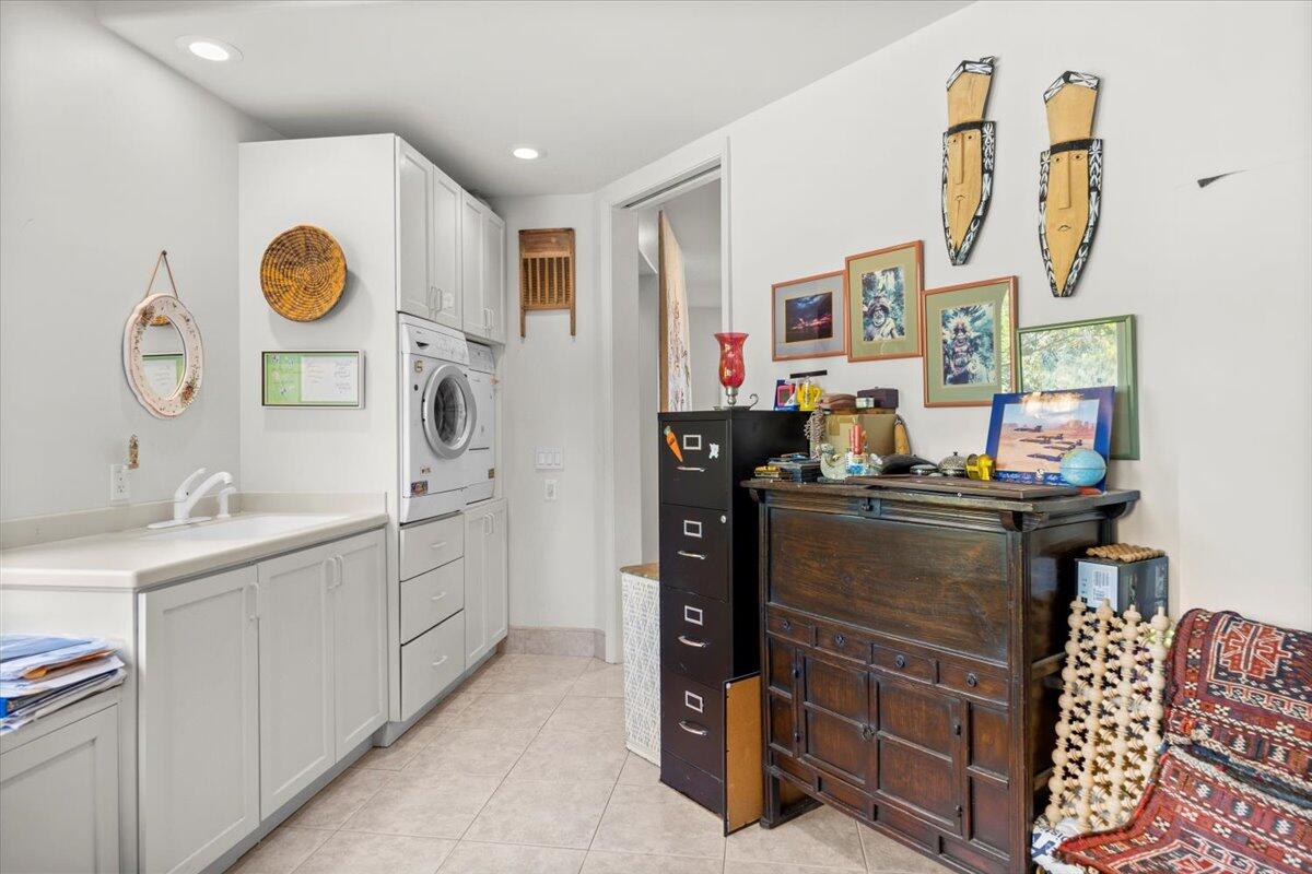 221 Wynnehaven Beach Road Mary Esther, FL 32569 - Photo 27 of 35 a kitchen with stainless steel appliances granite countertop a sink and a stove