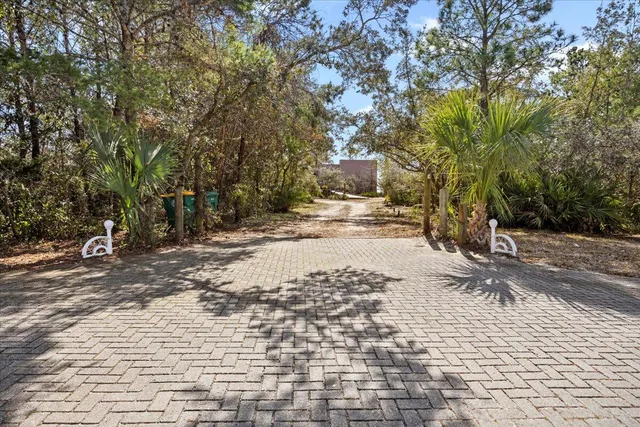 a view of a backyard of the house