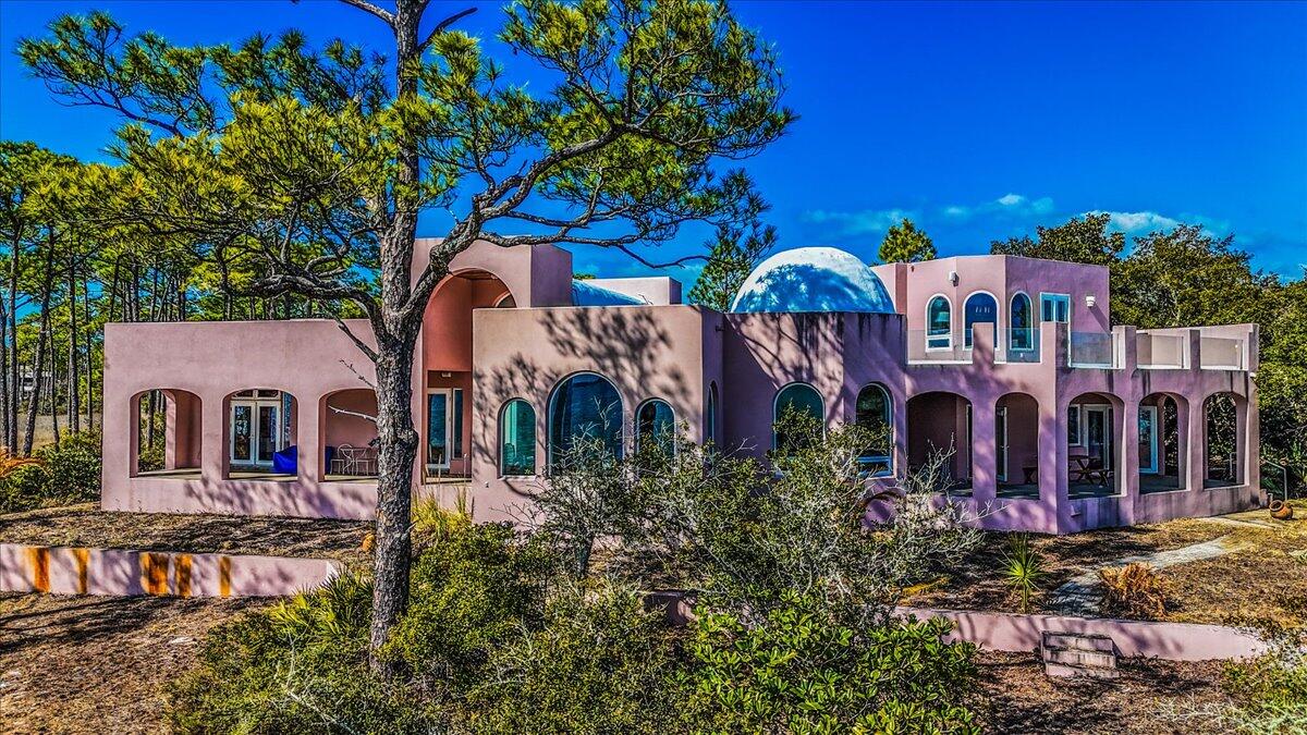 221 Wynnehaven Beach Road Mary Esther, FL 32569 - Photo 9 of 35 a front view of house with yard and trees