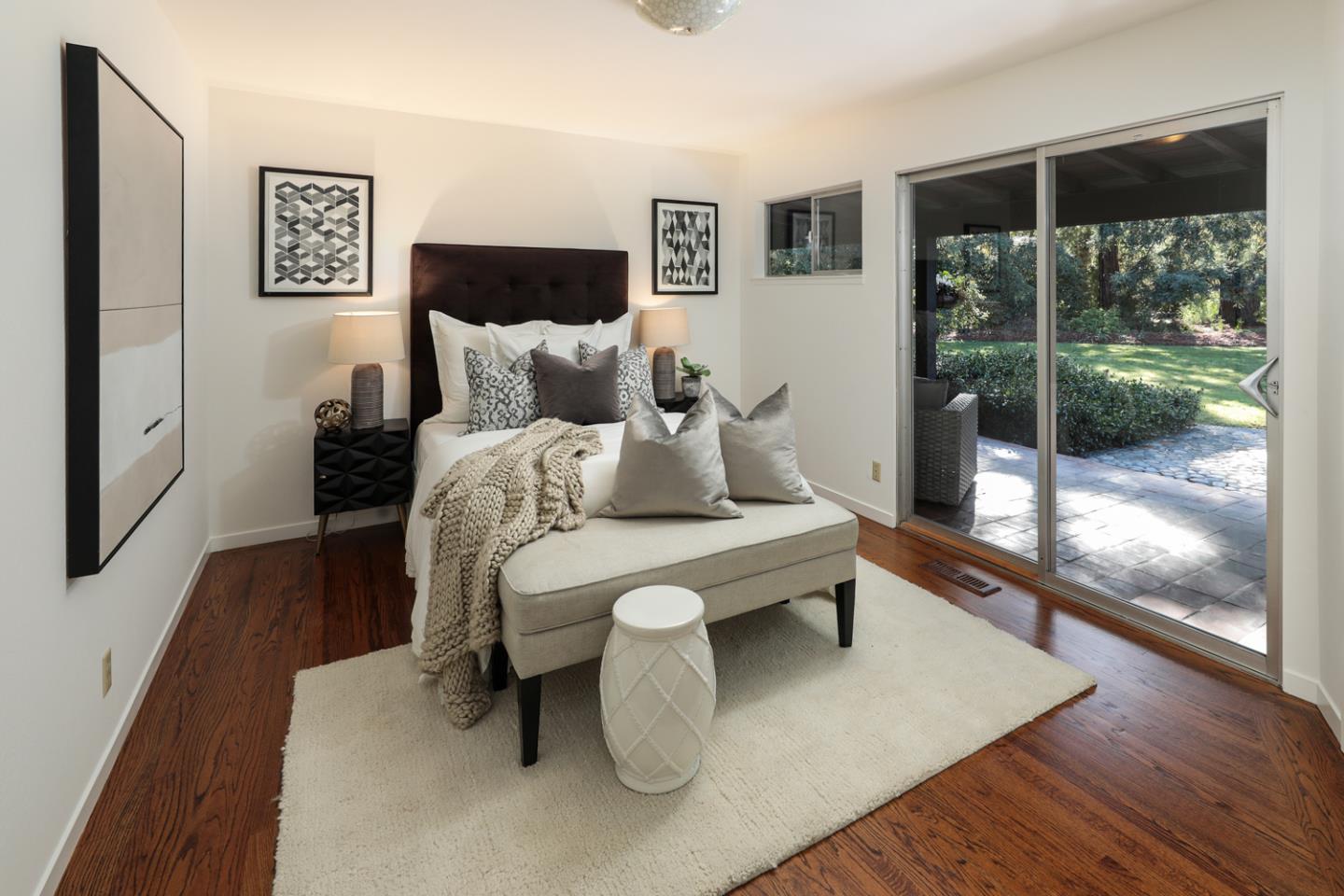 95 Mulberry Lane Atherton, CA 94027 - Photo 11 of 26 a living room with furniture large window and wooden floor