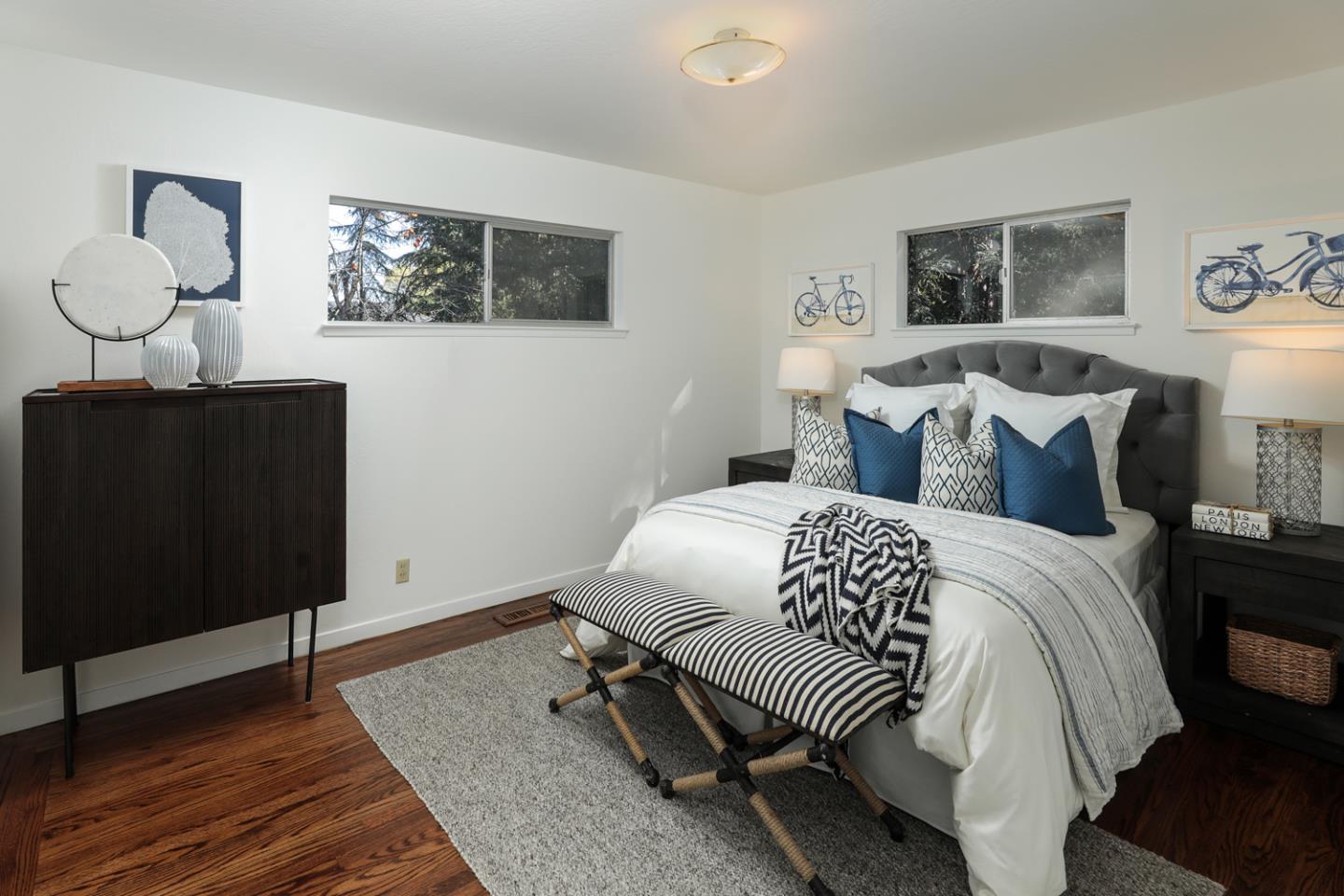 95 Mulberry Lane Atherton, CA 94027 - Photo 13 of 26 a bedroom with a bed and wooden floor