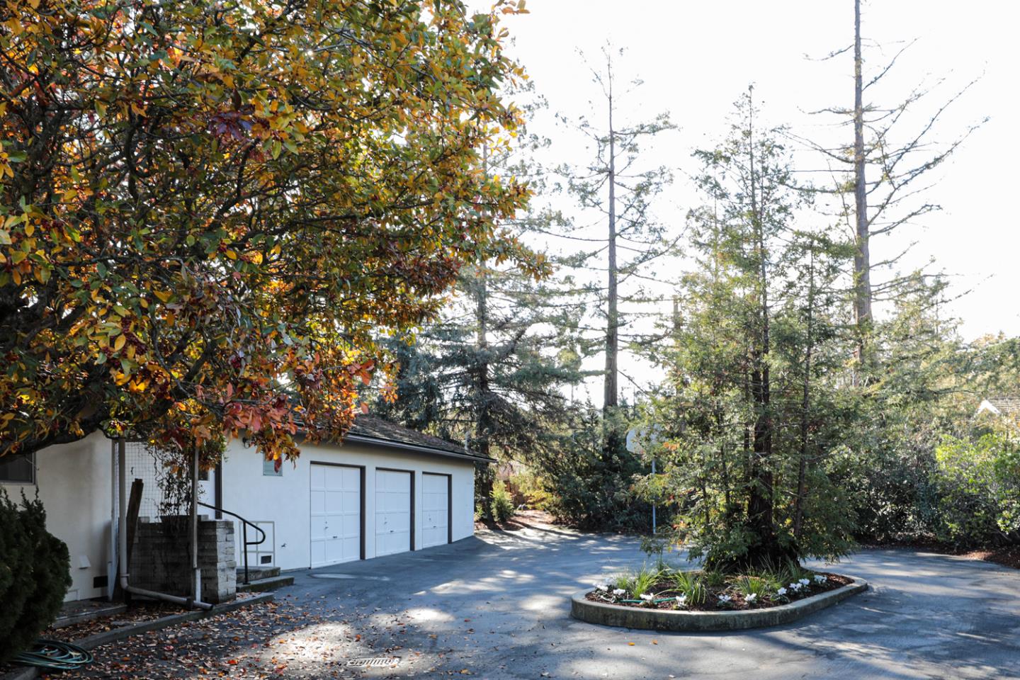 95 Mulberry Lane Atherton, CA 94027 - Photo 19 of 26 a view of a house with a tree