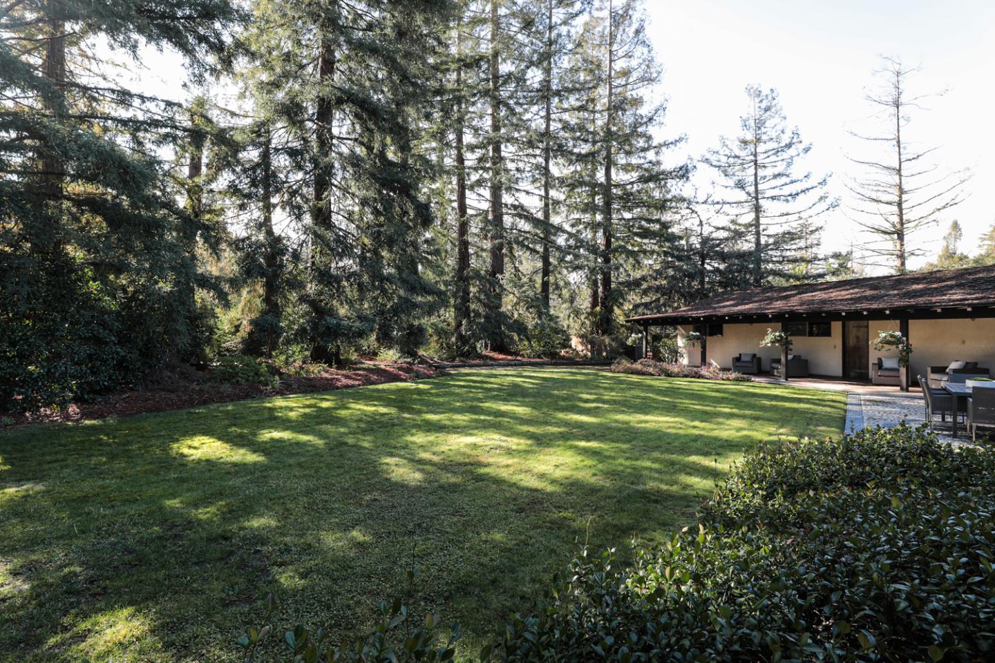 95 Mulberry Lane Atherton, CA 94027 - Photo 22 of 26 a view of a house with a yard
