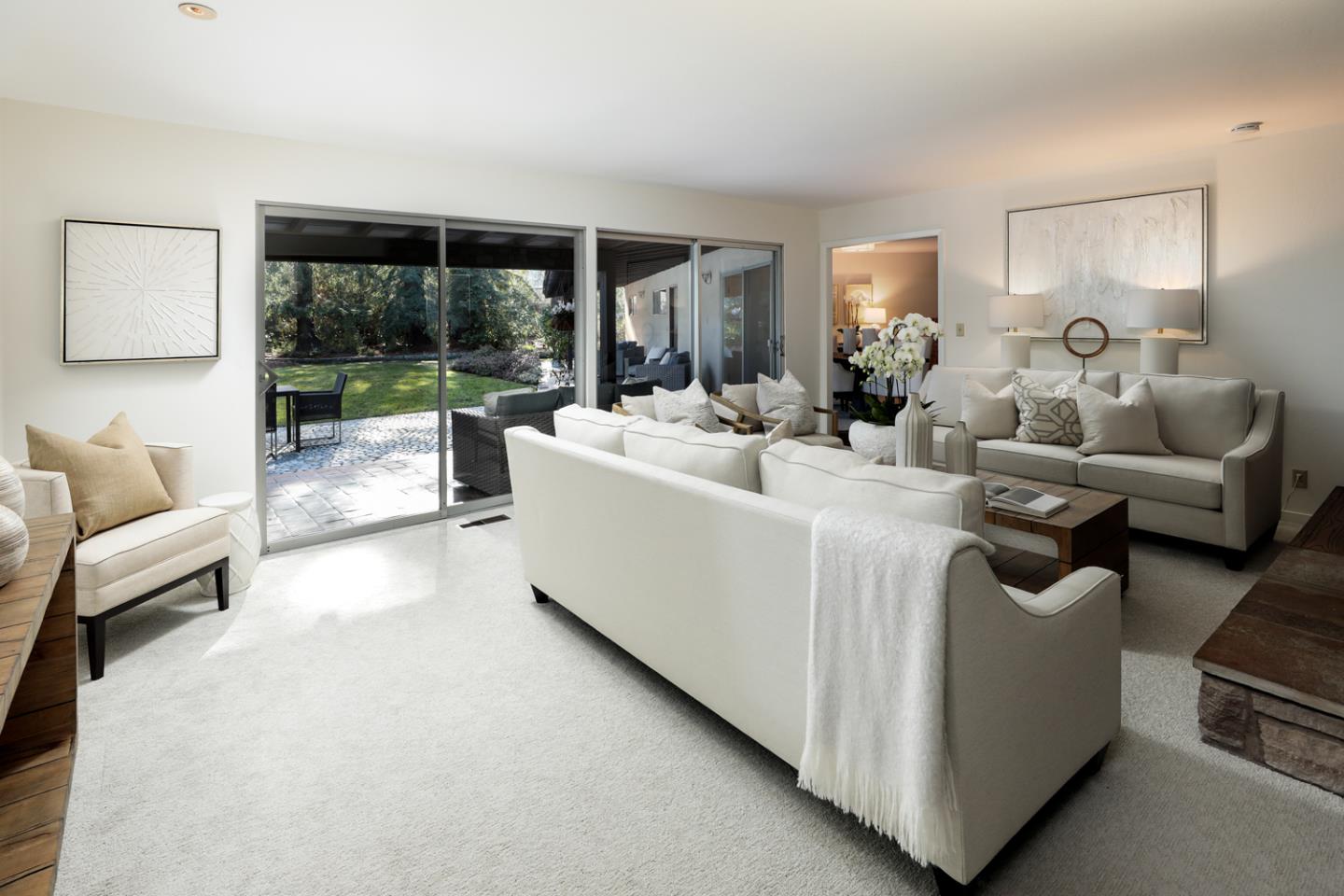 95 Mulberry Lane Atherton, CA 94027 - Photo 4 of 26 a living room with furniture and a large window