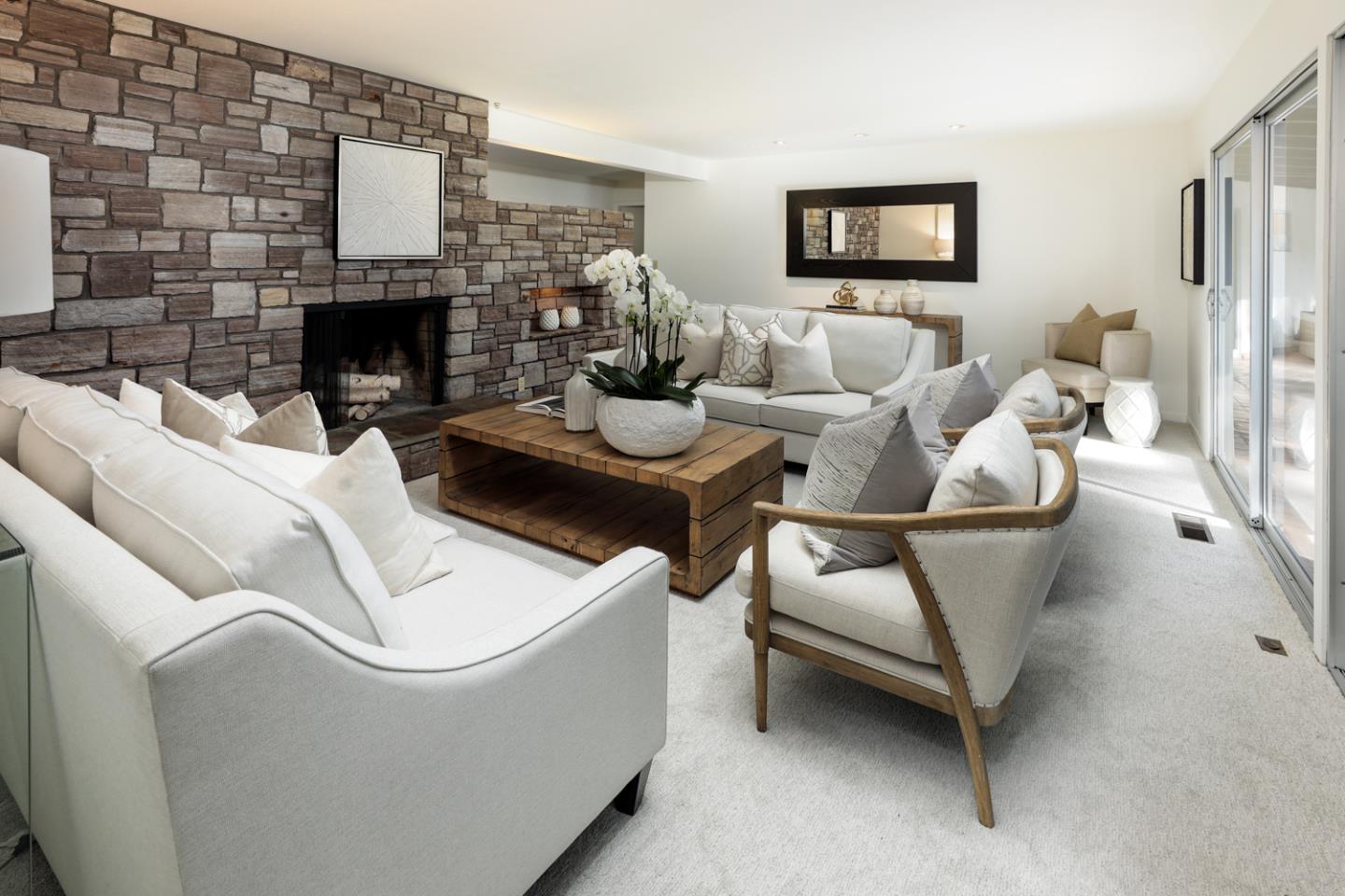 95 Mulberry Lane Atherton, CA 94027 - Photo 5 of 26 a living room with furniture and a fireplace