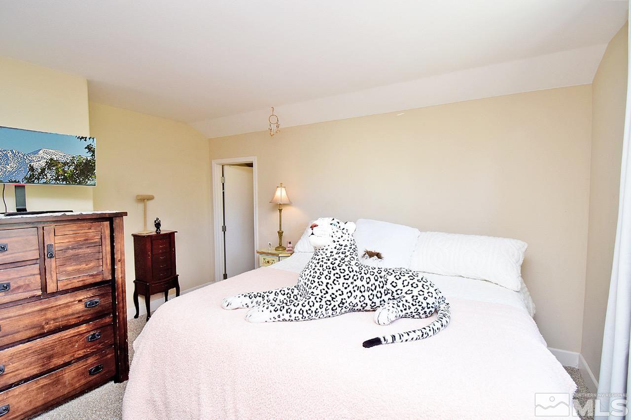 2735 Gulling Court Reno, NV 89503 - Photo 20 of 30 a large white bed in a white room