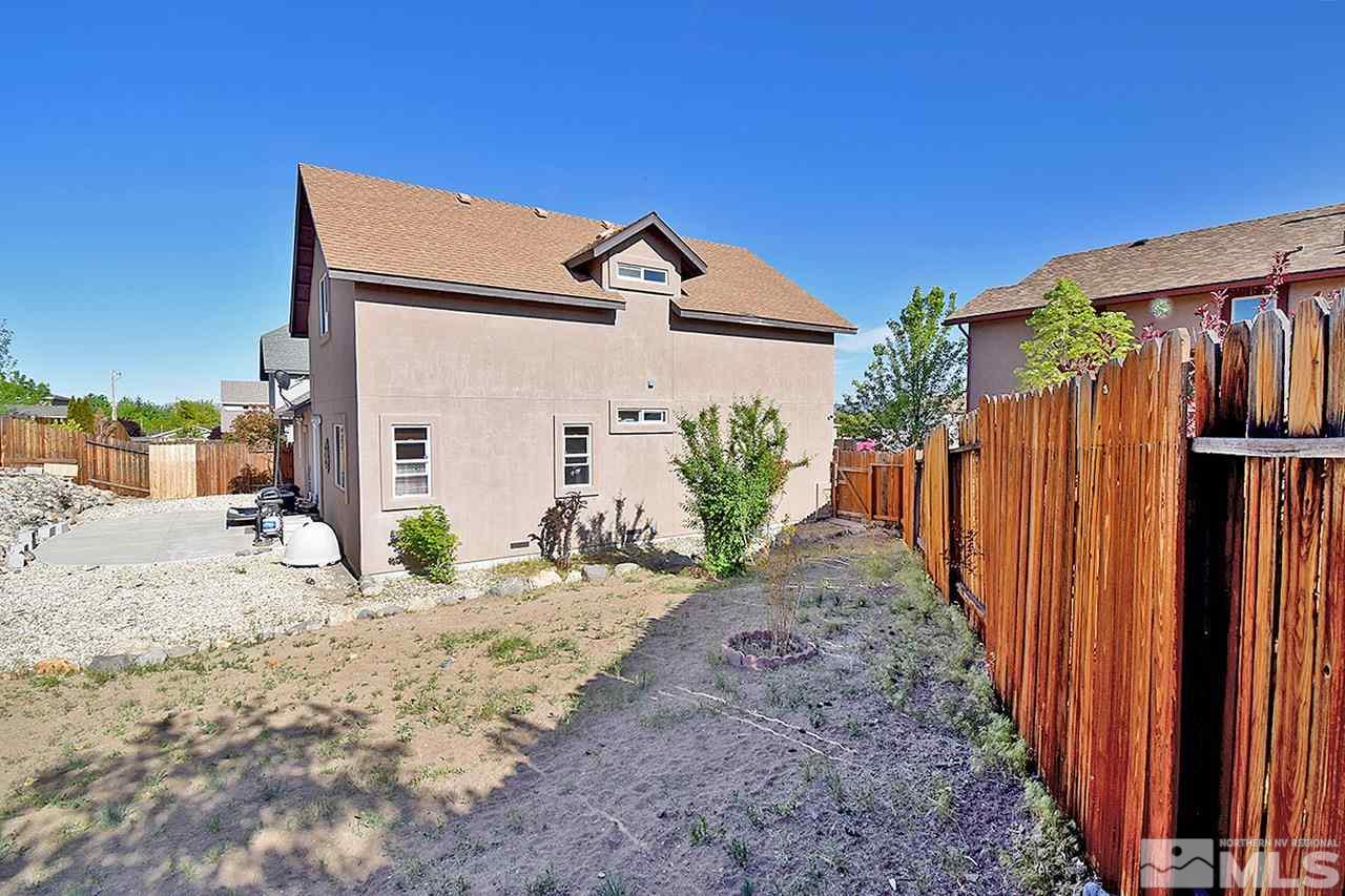 2735 Gulling Court Reno, NV 89503 - Photo 28 of 30 a view of a road with wooden fence