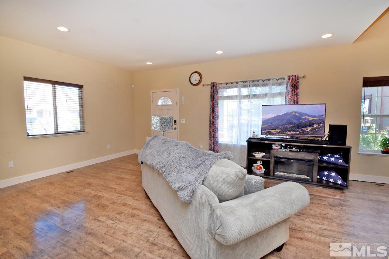2735 Gulling Court Reno, NV 89503 - Photo 8 of 30 a living room with furniture and a flat screen tv