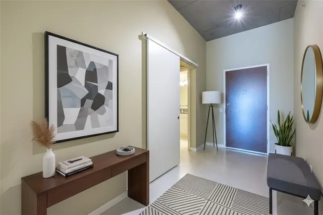 a view of a hallway with workspace