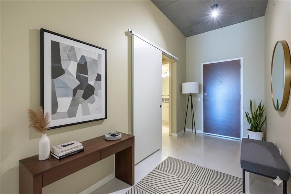 335 West Ponce De Leon Avenue, Unit 506 Decatur, GA 30030 - Photo 2 of 49 a view of a hallway with workspace