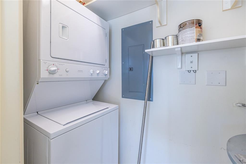 335 West Ponce De Leon Avenue, Unit 506 Decatur, GA 30030 - Photo 42 of 49 a utility room with dryer and washer
