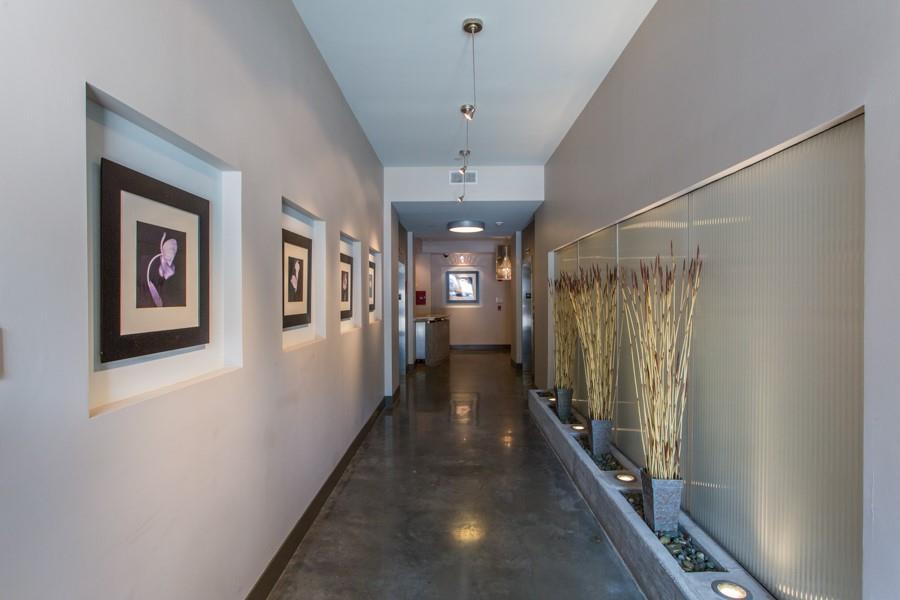 335 West Ponce De Leon Avenue, Unit 506 Decatur, GA 30030 - Photo 44 of 49 a view of a hallway with wooden floor and staircase