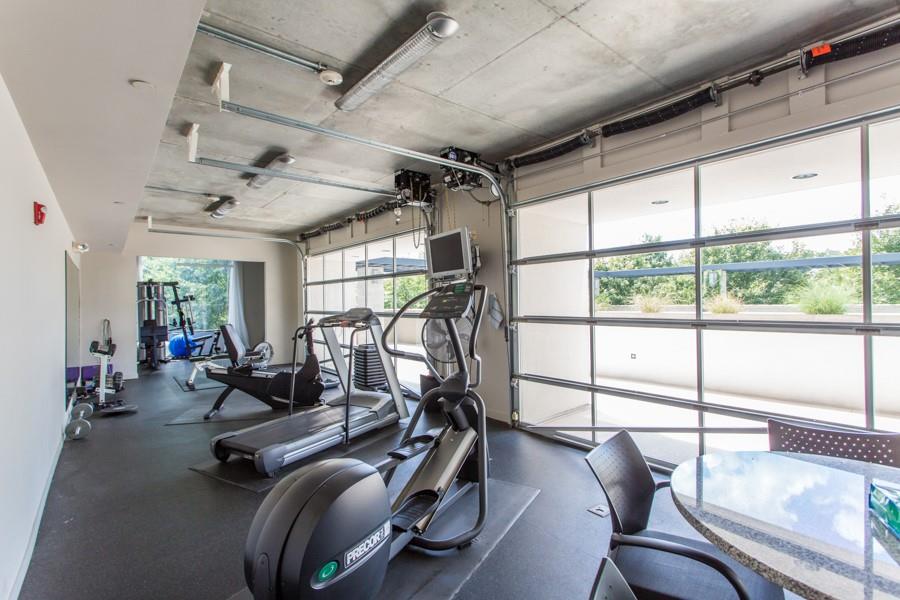 335 West Ponce De Leon Avenue, Unit 506 Decatur, GA 30030 - Photo 45 of 49 a view of a room with gym equipment